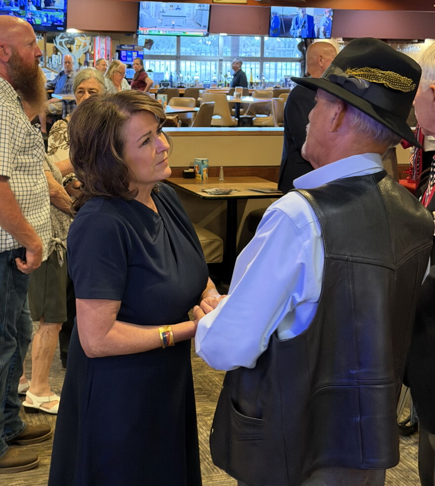 Former state Sen. Sine Kerr, who is running for Arizona lieutenant governor, speaks with an unidentifed voter in Yuma on Monday, Sept. 7, 2026.