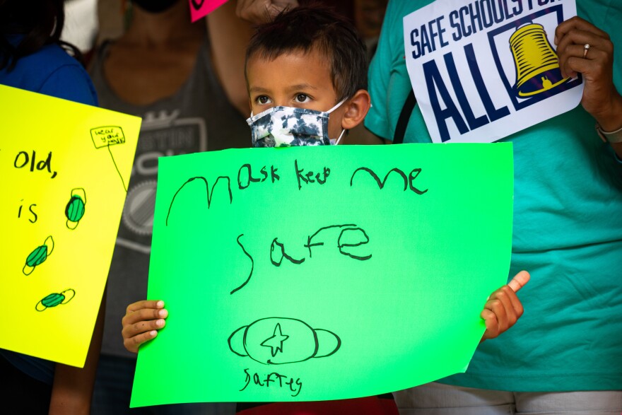 Luke Bonzek at a press conference at Travis Heights Elementary School in Austin, TX on Aug. 9, 2021 held by Safe Schools for All, a group of Austin ISD families, students, teachers, and school staff advocating for a response to the state mask ban and TEA’s COVID guidance in response to rising COVID-19 Delta variant numbers. Gabriel C. Pérez/KUT