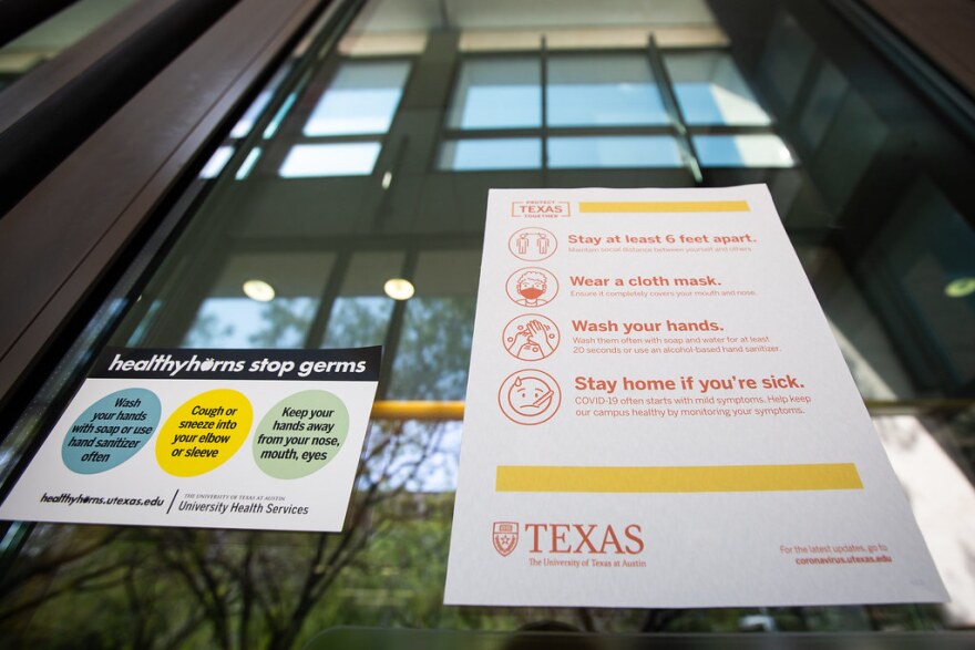 COVID-19 safety guidelines posted on the UT Austin campus on Aug. 21.