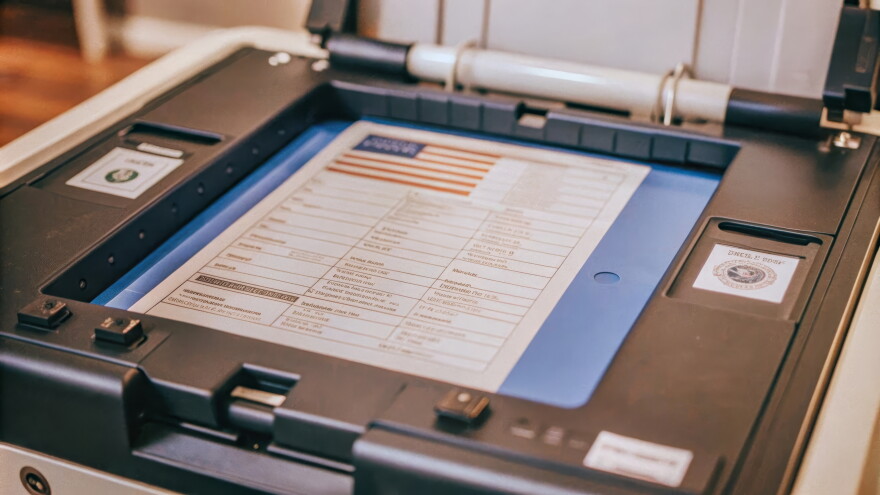 Photo of a voting machine.