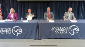 2022 Board of Commissioners candidates, from left: LeAnn Pierce (R), Travis Robinson (D), Tom Toby (R), and Rob Zapple (D).