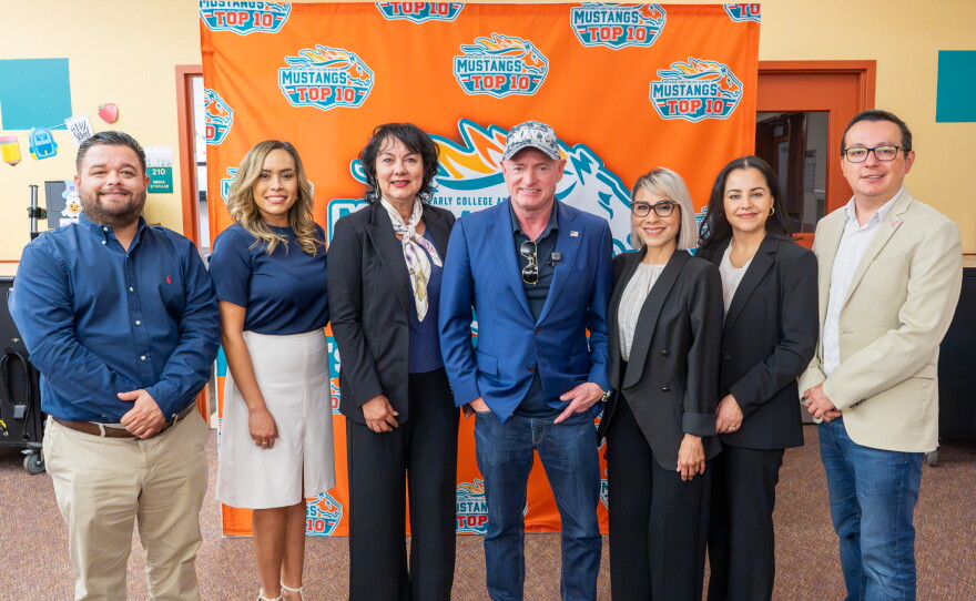 Kelly poses for a photo with the Gadsden School District governing board and leadership.
