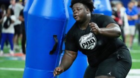 Florida defensive lineman Desmond Watson, who graduated from Armwood High School in Hillsborough County, performs a drill during the school's NFL football pro day, Thursday, March 27, 2025, in Gainesville.