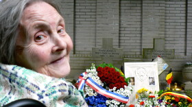Jenny Abeels visits the graves of her brother, Roger, and U.S. airman Jerry Sorensen. The pair were killed after working with resistance forces in Belgium.