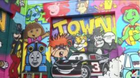 The graffiti-laden warehouse is known as Toon Town.
