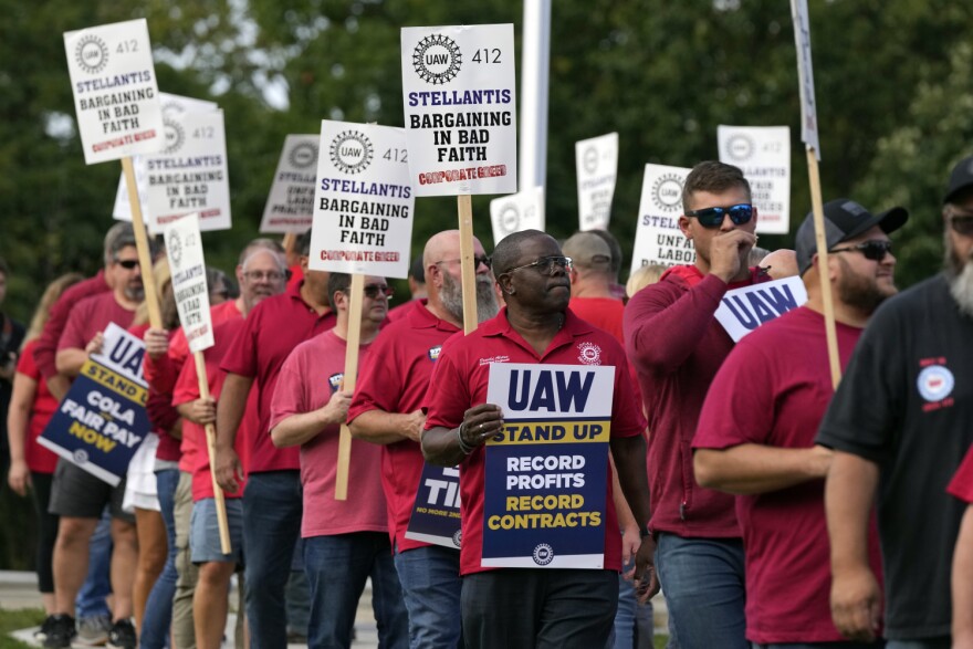 United Auto Workers march outside the Stellantis North American Headquarters, Wednesday, Sept. 20, 2023, in Auburn Hills, Mich.