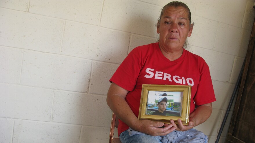 Maria Guereca in her apartment in Juarez, Mexico, holding a picture of her son, Sergio Hernandez the day the Supreme Court news came down. He was killed by a Border Patrol agent seven years ago this month.