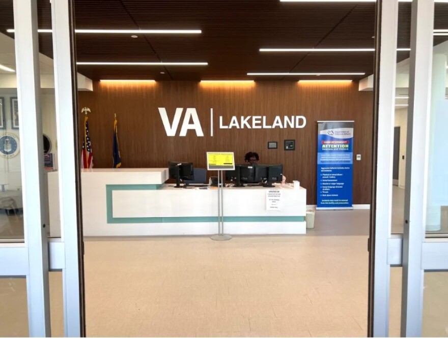 Looking inside an office building with VA Lakeland on the wall