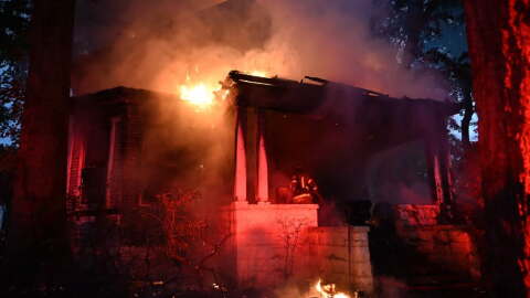 Evansville firefighters battle a house fire in the 1400 block of SE 2nd St., Sun., Sept. 27, 2026