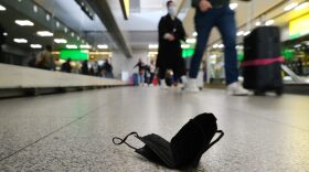 A mask is seen on the ground at John F.  Kennedy Airport in New York City. 
