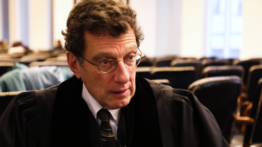 U.S. District Judge Dan Polster, seen here in a file image from in a March interview at a naturalization ceremony, is overseeing more than 2,000 lawsuits over the opioid crisis. [Mary Fecteau / ideastream]