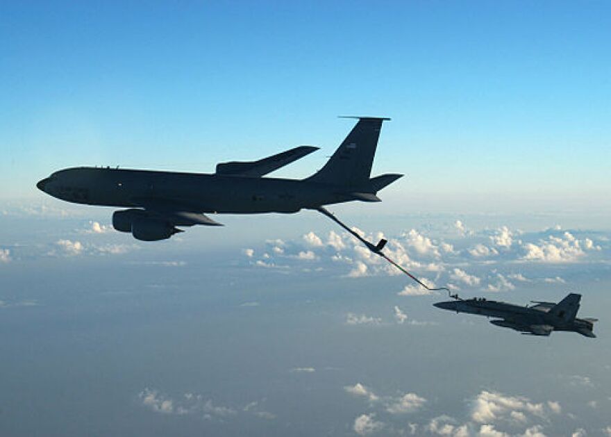 One of the US Airforce's aging KC-135 tankers refuels an F-18 Hornet midflight. The contract to replace the US fleet of refuelling tankers is estimated to be worth $40 B.