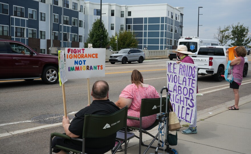 Demonstrators participate in Indivisible Knoxville’s Labor of Love protest on Henley Street Bridge in Knoxville on September 1, 2025.
