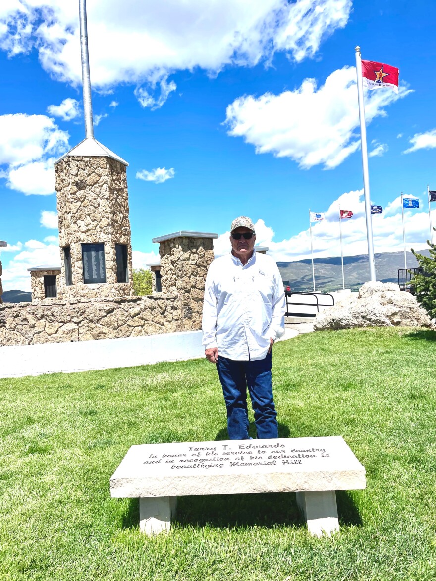 Terry Edwards in front of his commemorative bench