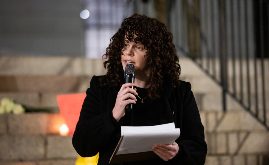Katie Randall, an organizer with Siembra NC, speaks at a vigil for Renee Good and other victims of ICE violence is held on the steps of the Alton Lennon Federal Building in downtown Wilmington on January 14, 2025. Good was shot and killed by an ICE agent in Minneapolis earlier this month.