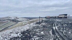 The Seneca Meadows landfill rises as a horseshoe-shaped hill in Seneca Falls, NY.