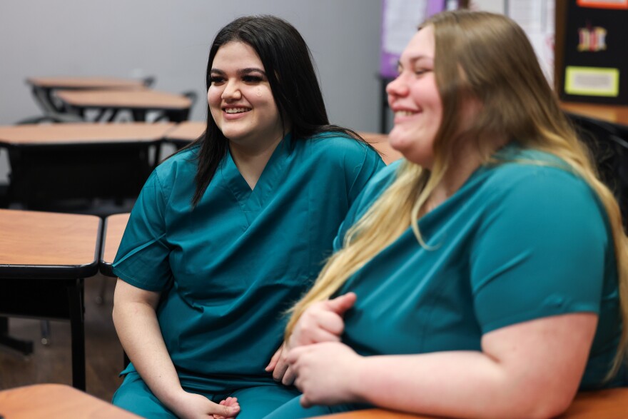Amanda De Anda and Triniti Stone talk about putting on the health fair through the Community Health Worker certificate program Wednesday, Jan. 17, 2024, at Evolution Academy Charter School in Richardson.
