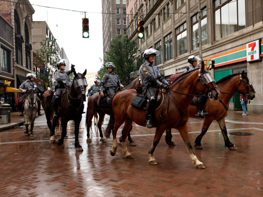 Mounted police patrol the streets of downtown in preparation for the G-20 Summit in Pittsburgh, Pa.
