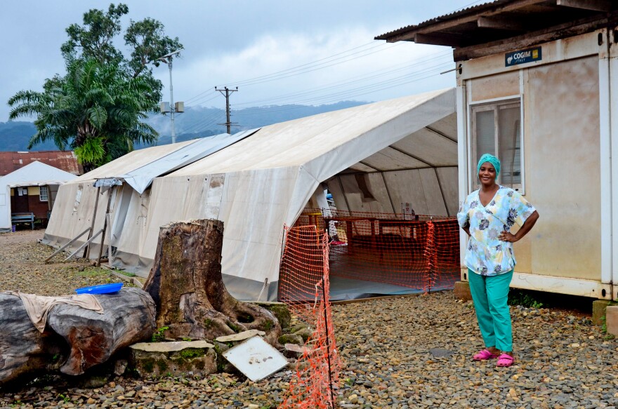 Nurse Isata Kallon outside of the triage tent.