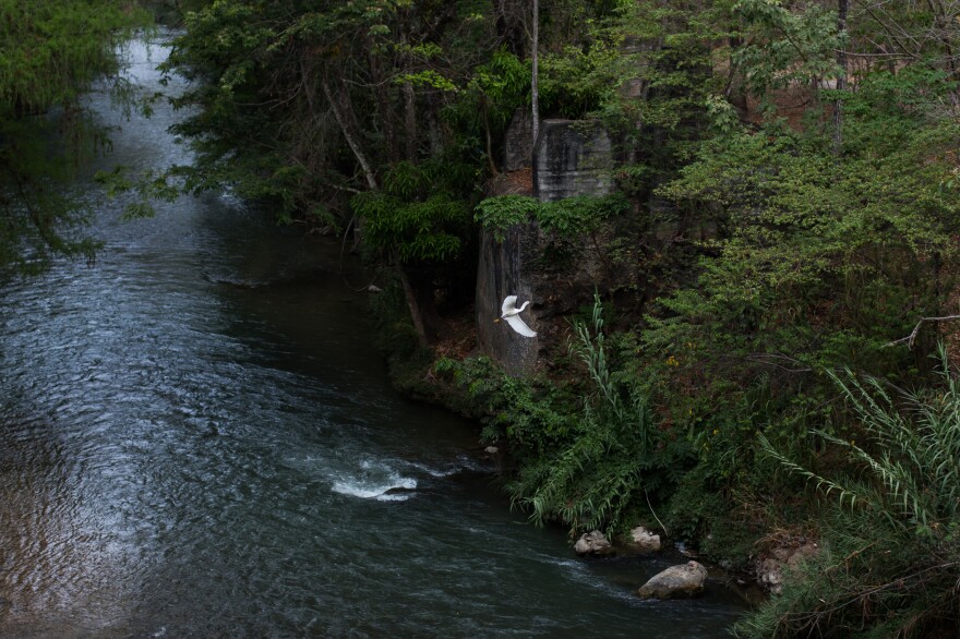 Morning on the Río Azul in Guatemala just south of the border with Mexico. Minimal police presence in the countryside between interior parts of Chiapas, Mexico, and Guatemala allows for relatively easy passage across the border.