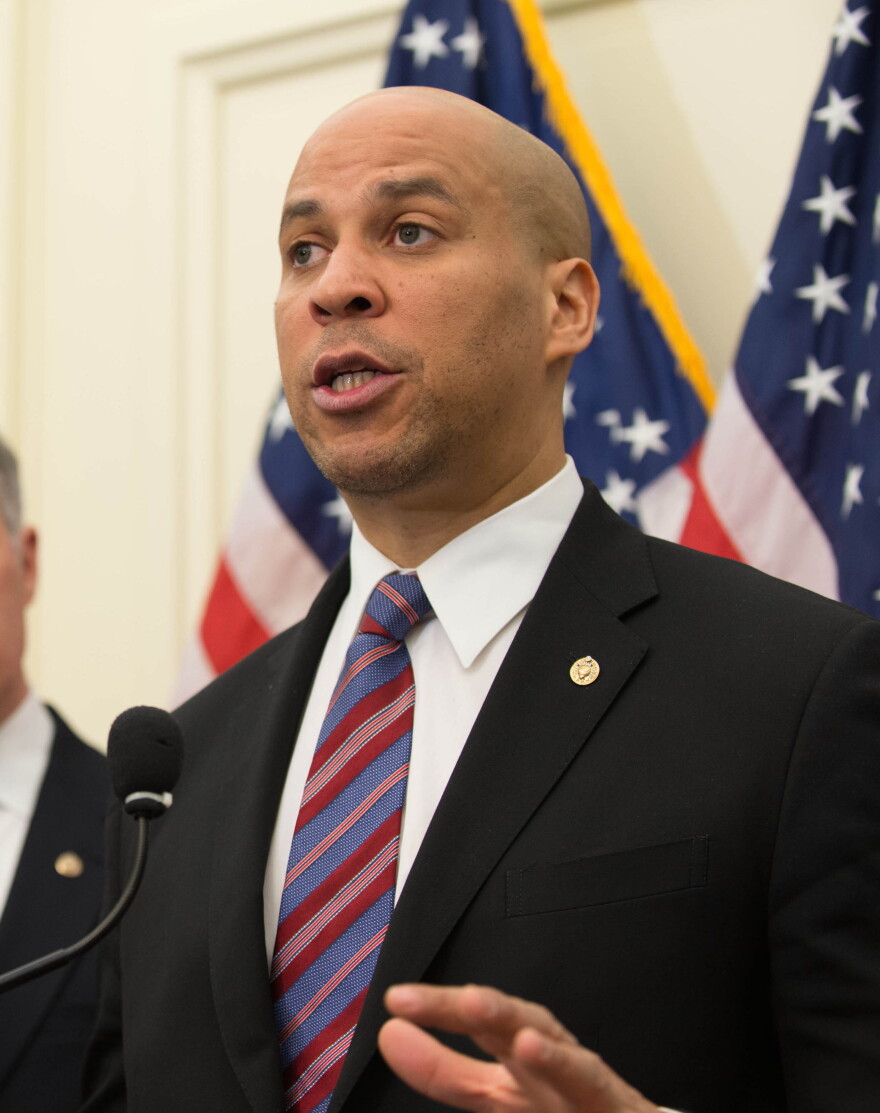 US Senator Cory Booker (D-NJ) with fellow Senate Democrats pushing for a raise in the Minimum Wage