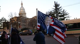 Supporters of then-President Donald Trump gather outside the Michigan State Capitol in 2020.