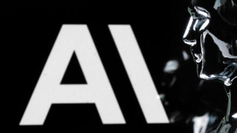 This photograph shows a figurine in front of the logo of the US artificial intelligence safety and research company Anthropic during a photo session in Paris on February 13, 2026. (Joel Saget / AFP via Getty Images)
