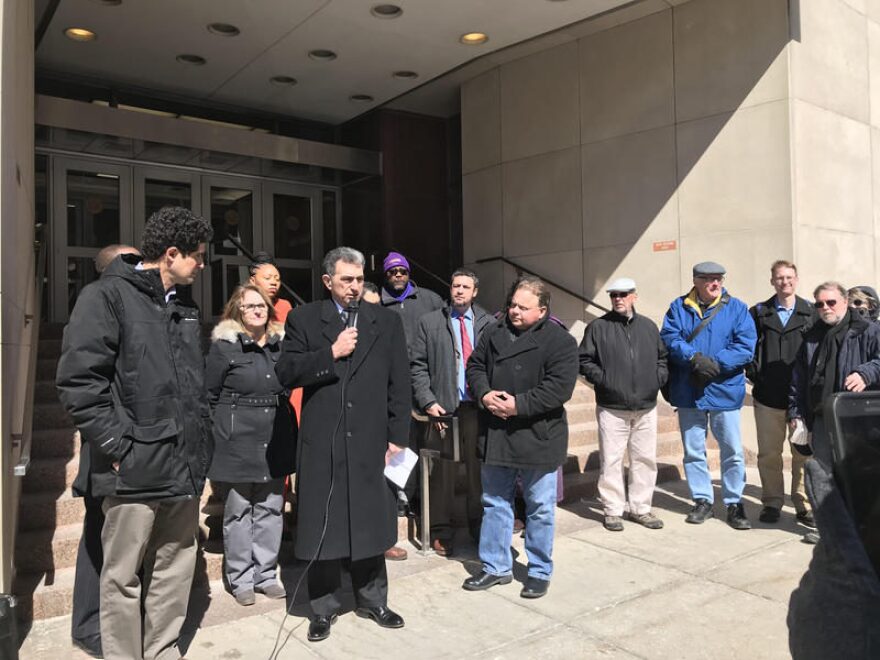 State Assemblyman Bill Magnarelli (D-Syracuse) speaks at a rally Friday in Syracuse ELLEN ABBOTT / WRVO NEWS