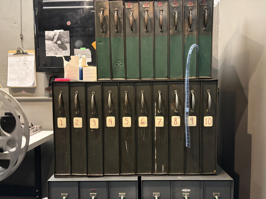 There are cases of film reels housed in the tech booth at the Oriental Theatre.