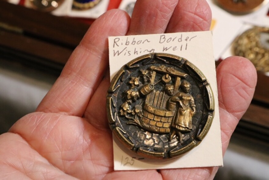 This hand etched button belonging to Lisa Schulz sells for $125.