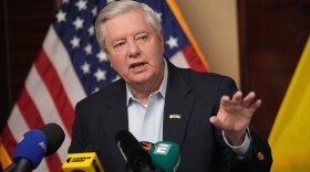 FILE - U.S. Sen. Lindsey Graham, R-S.C., gestures as he speaks to the media in Kyiv, Ukraine, March 18, 2024. (AP Photo/Vadim Ghirda, File)