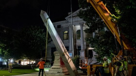 Crew members work to remove a 30-foot Confederate monument on June 19, 2020, in Decatur, northeast of Atlanta, Georgia. (Chandan Khanna/AFP via Getty Images)