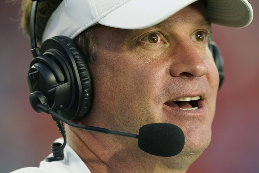 Mississippi head coach Lane Kiffin participates in a televised interview following his team's 31-17 win over LSU during an NCAA college football game in Oxford, Miss., Saturday, Oct. 23, 2021. (AP Photo/Rogelio V. Solis)