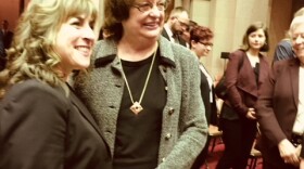 NY Attorney General Bararba Underwood posing with state Assemblywoman Christine Pelligrino as lawmakers lined up to get their picture taken with Underwood.