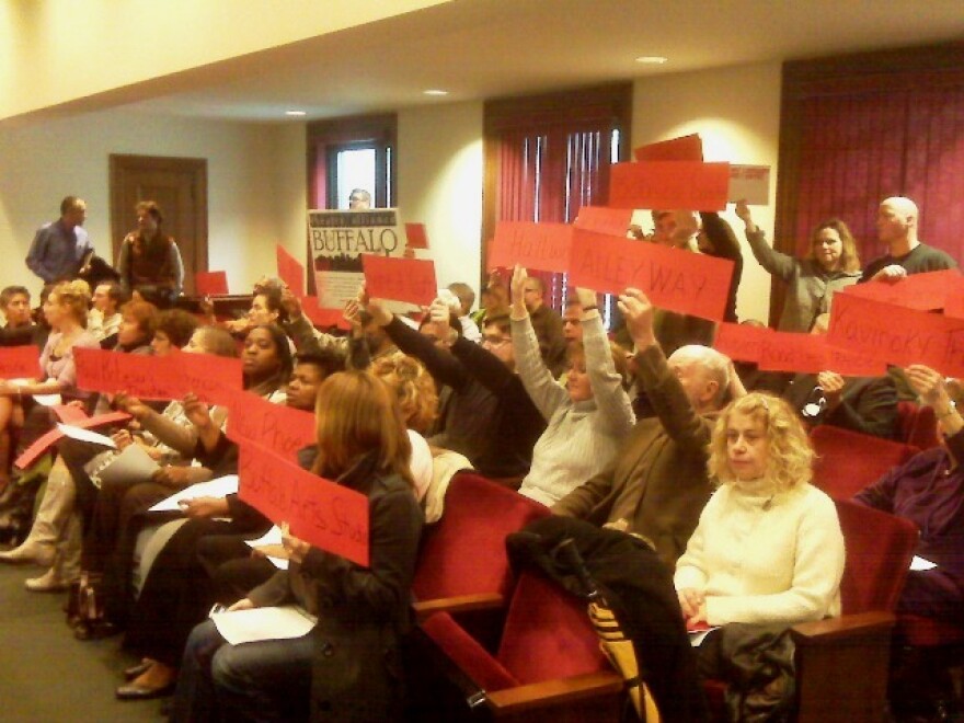Members of the region's cultural and arts organization wait for budget vote