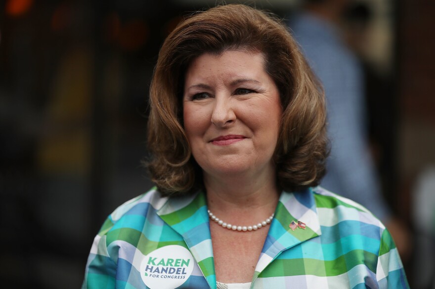 Republican candidate Karen Handel greets people during a campaign stop in her bid for Georgia's 6th District seat on Monday in Alpharetta.