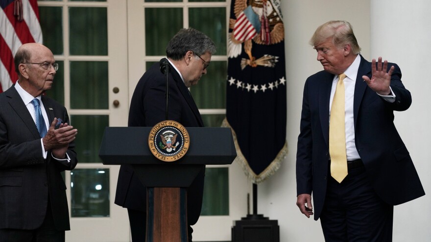 President Trump departs a July 2019 press conference on the census with U.S. Attorney General William Barr (center) and Commerce Secretary Wilbur Ross in the White House Rose Garden.