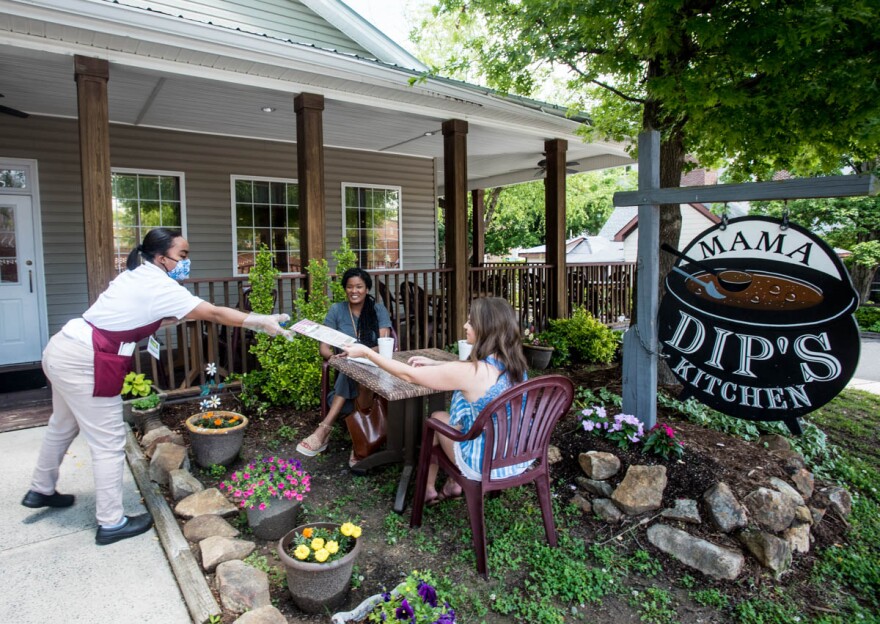 Nicole Willis, left, of Clayton, NC, dines with her friend Crystal Keefe of Raleigh, on Saturday morning at Mama Dip's Kitchen in Chapel Hill, NC. 