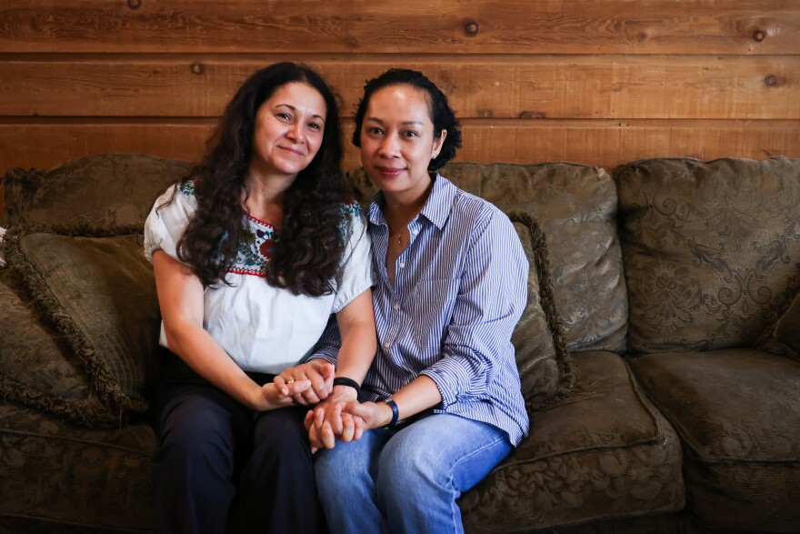 Artist Frida Espinosa Muller sits with Rosemarie Suegay who survived breast cancer ahead of the ‘Tell Her Story’ group exhibition on Tuesday, October. 7. 2025, in Dallas.