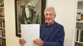  John Perkel, holding up the yet-unperformed Bernstein string quartet.