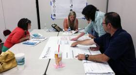 A group of residents participating in the Hometown Collaboration Initiatives brainstorm Orange County's placemaking needs.