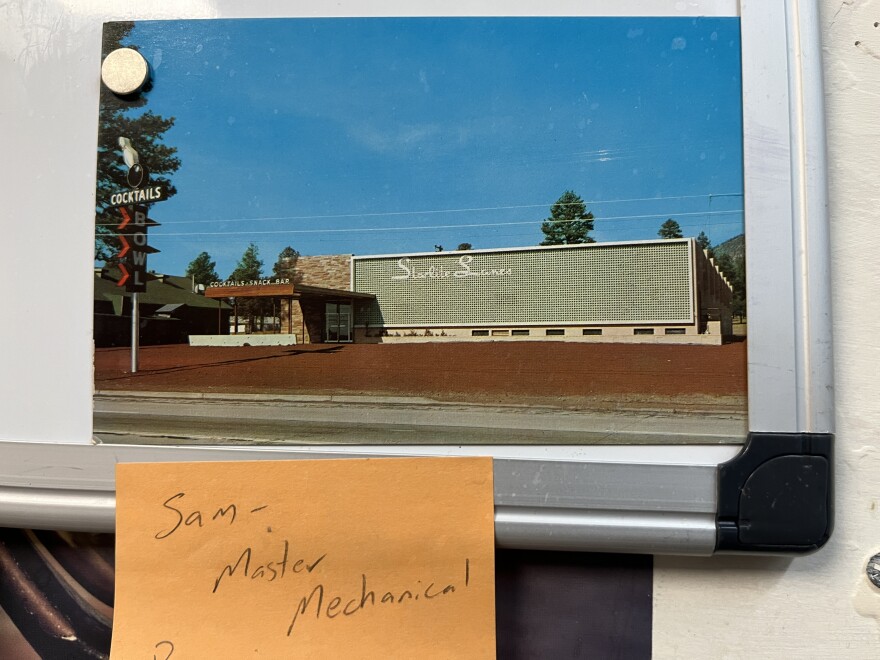 A vintage postcard on the whiteboard of the back office depicts Starlite Lanes in an earlier era, June 4, 2025.