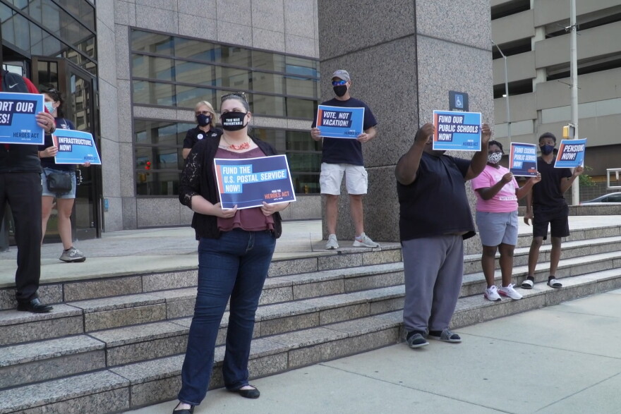 Around fifteen people rallied, starting at Senator Young's office at 12:30 pm before moving to Senator Braun's.