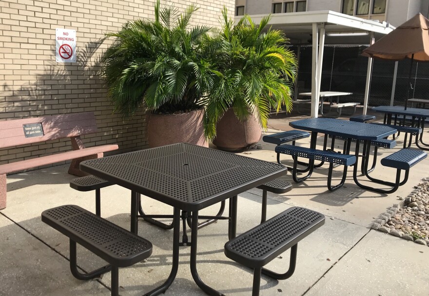 Formerly a designated smoking area, this patio outside the VA hospital in Tampa now is posted with "No Smoking" signs.