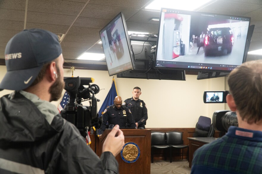 At the Sept. 22 news conference, EPD Chief Philip Smith shares the still frame from officer Sam Taylor's body camera footage — the frame that allegedly shows suspect Jailani Chew taking a shooting position, at Taylor.