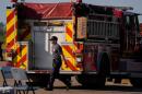 Fire crews and truck assemble at the Brantley County Airport as they work the Brantley highway 82 fire, Thursday, April 23, 2026, near Nahunta, Ga. (Mike Stewart/AP)
