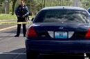 A KCPD officer guards a recent murder scene. There have been 11 homicides in South Patrol so far this year. Last year at this time there were zero.