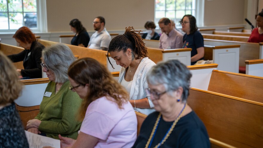 Natasha Lovelace bows her head in prayer at Forest Hill Church, Presbyterian during a service on Oct. 19th, 2025.