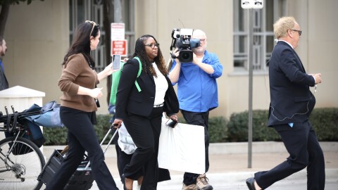 MarQuetta Clayton, attorney for Maricela Rueda, is followed by press as she leaves the federal courtroom after a mistrial over her shirt during the Prairieland ICE shooting trial in Fort Worth.