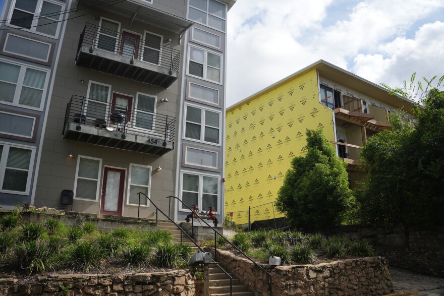 The area around the historic site has several multi-story, multi-unit housing developments around it, including these two buildings located diagonally across St. Francis Street.